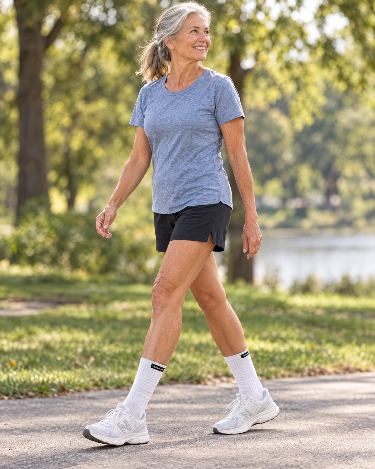 Person wearing the STEADY+ Cushion Compression Crew Socks | White