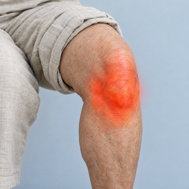 Knee with the painful area highlighted in red